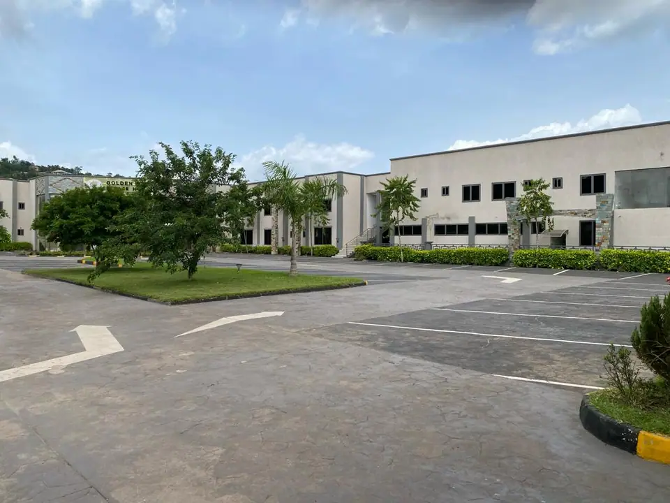 Landscaped grounds and guest wings at Golden Gift Palace Hotel