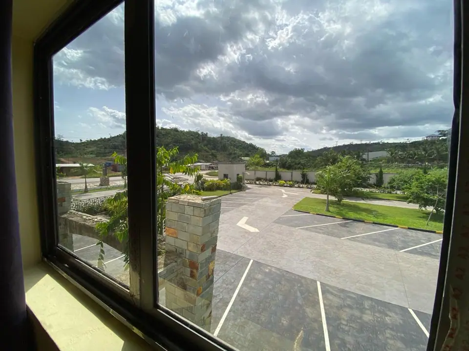 View over the hotel grounds towards the hills